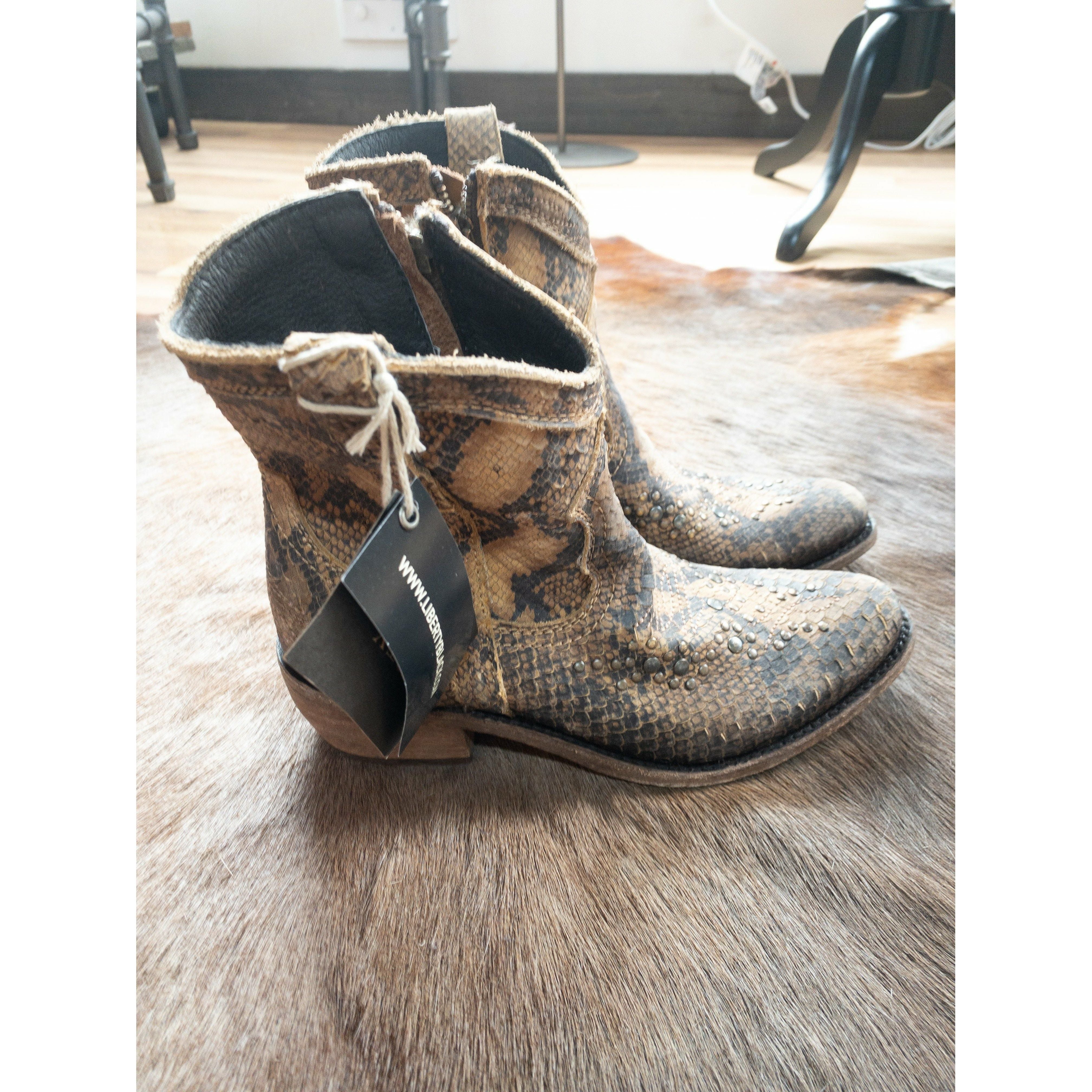 Liberty black python boots 2025